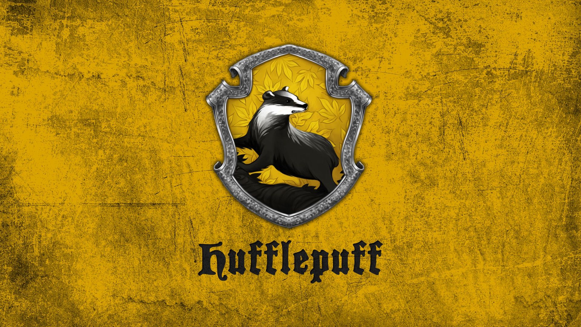 23740-hufflepuff-logo-harry-potter-movie-desktop-wallpaper-1920x1080.jpg